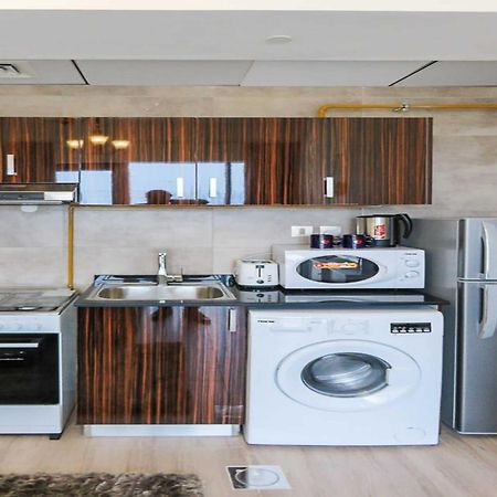 Oyo 860 Studio Apartment, Maya Tower 4, Jumeirah Village Triangle Dubai Exterior foto