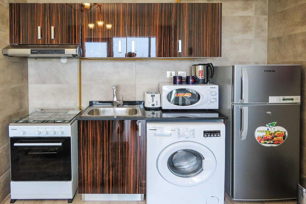 Oyo 860 Studio Apartment, Maya Tower 4, Jumeirah Village Triangle Dubai Exterior foto