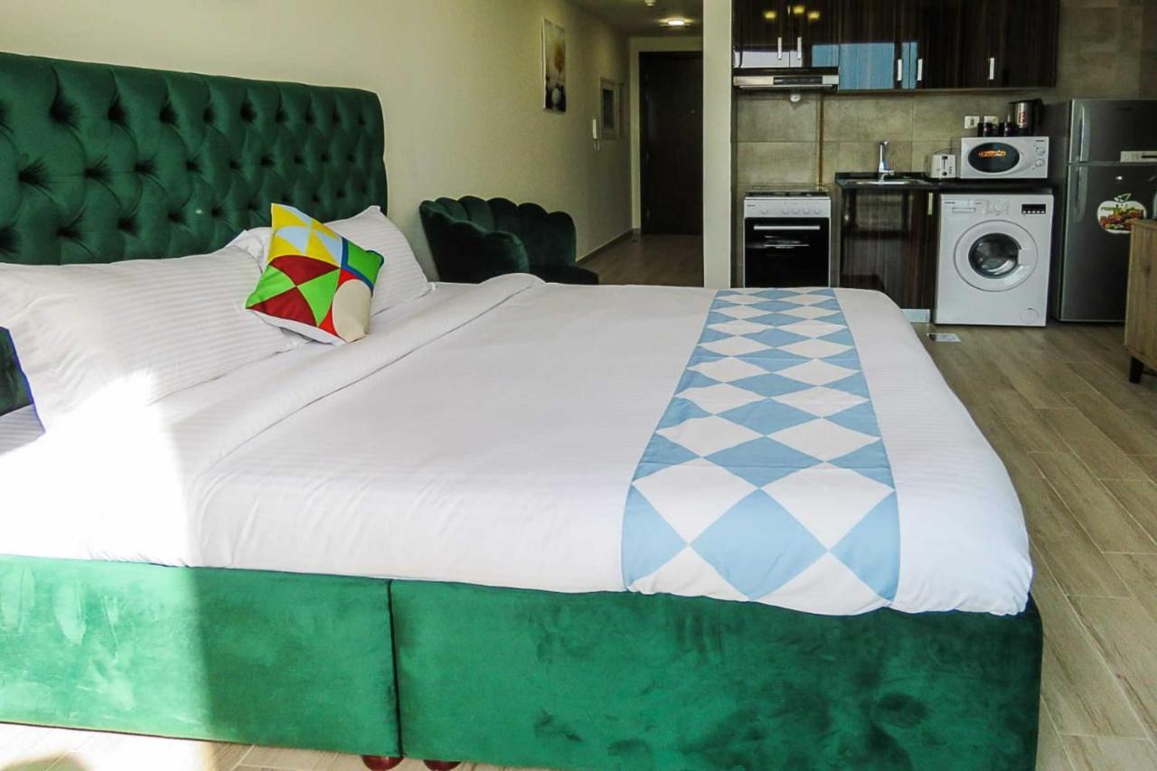 Oyo 860 Studio Apartment, Maya Tower 4, Jumeirah Village Triangle Dubai Exterior foto